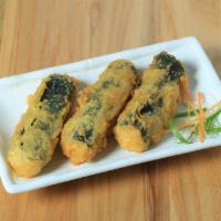 Fried Seafood Seaweed Roll - 紫菜卷 · Shrimp and crab wrapped in seaweed, battered and deep fried