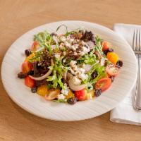Green Salad · Green salad with oranges, cherry tomatoes, cranberries, Gorgonzola, and red onion with balsa...