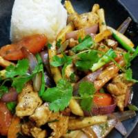 Chicken Stir Fry · Sauteed chicken with onions, tomato wedges, garlic and fries, tossed in a rich soy demi-glaz...