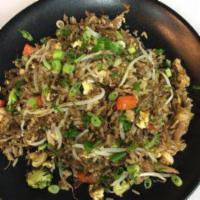 Stir Fried Rice · Arroz chaufa. Gluten-free. Vegetarian. Stir fried rice mixed with broccoli, green onions, mu...