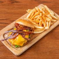 Tavern Burger · American cheese, applewood bacon, balsamic tomato chutney, arugula, fries.