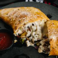 Philly Calzone · Steak or chicken topped with mushrooms, onions, green peppers and cheese.