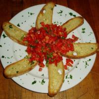 Bruschetta Pomodoro · Toasted Garlic Cibatta Crisps Served With Fresh Tomato Checca