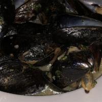 Steamed Mussels · Black Mussels Cooked In Butter White Wine And Shallots