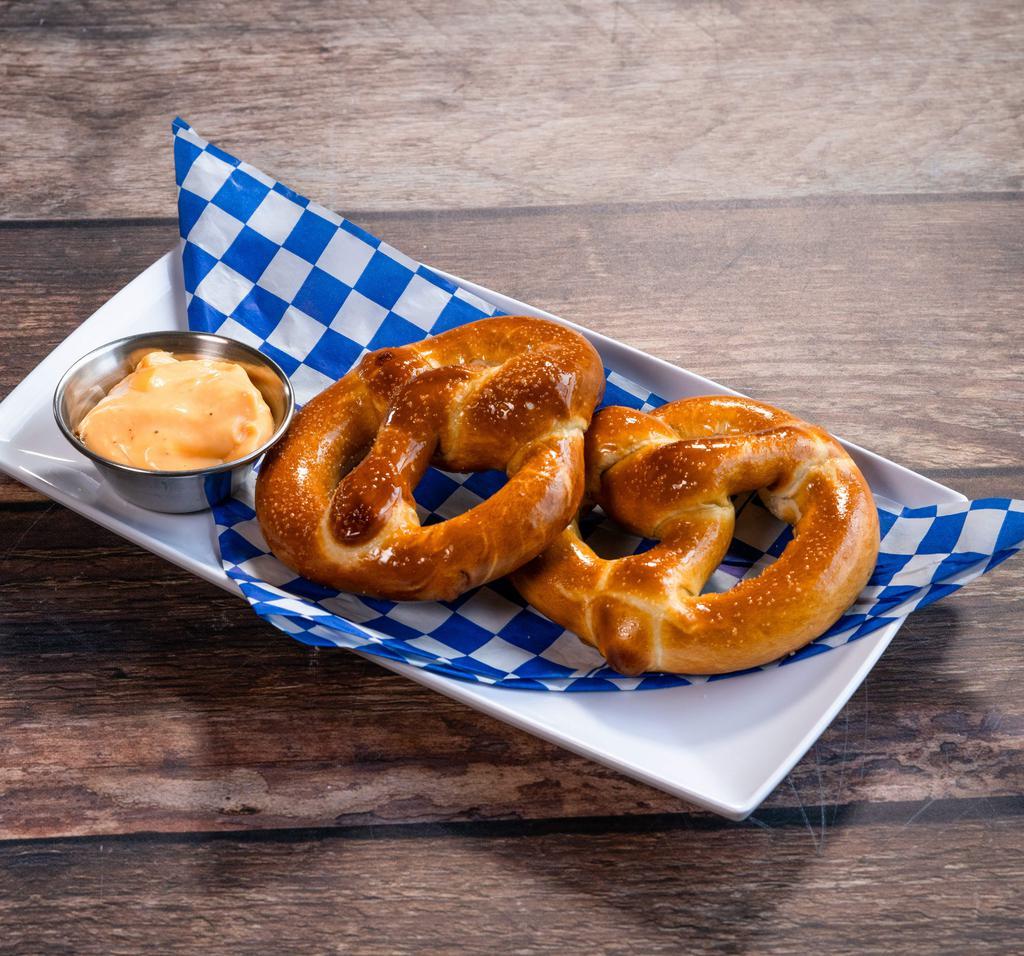 2 Pretzels · Served warm with beer cheese sauce.