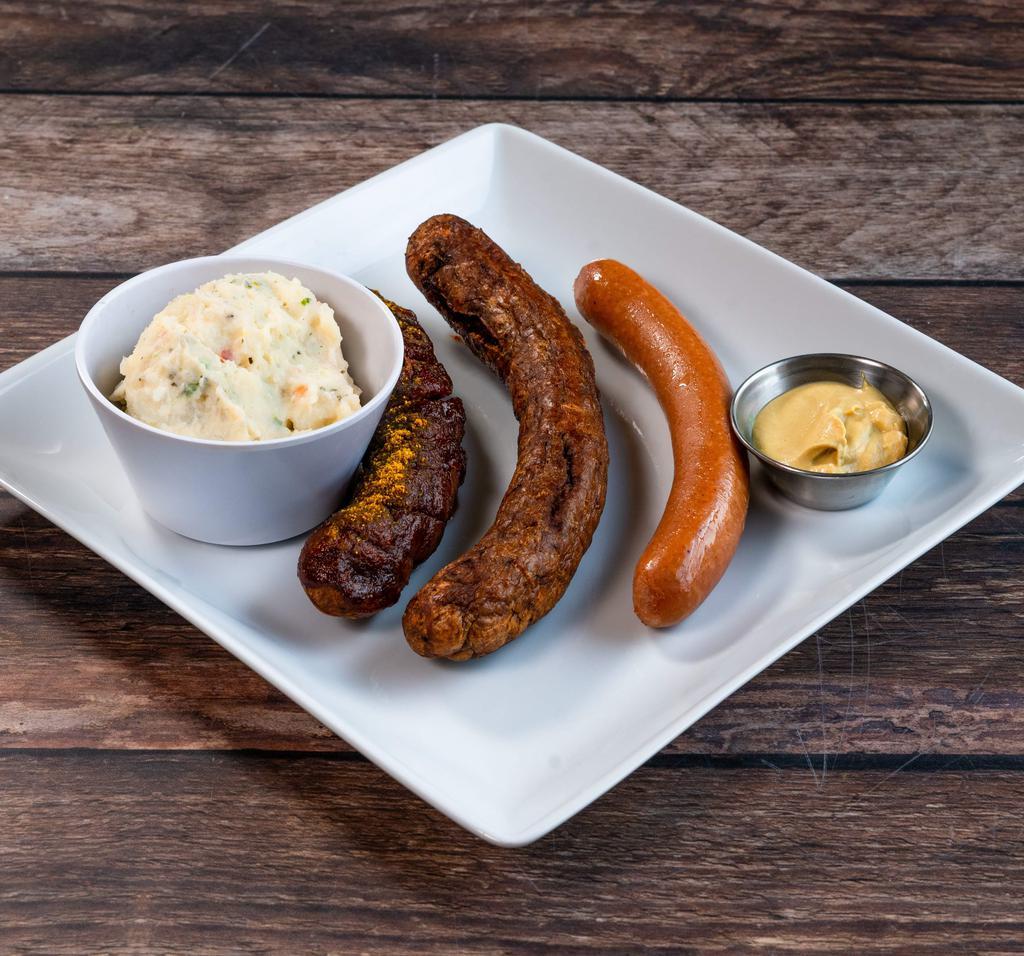 The Trio · Comes with bratwurst, currywurst and Frankfurter with 1 side.