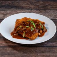 Jagerschnitzel · Served with mushroom sauce and choice of side.