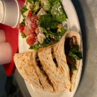 Vegetarian Quesadilla · Black beans, grilled bell peppers, onions, mushrooms, spinach, green salsa, Monterey Jack, a...