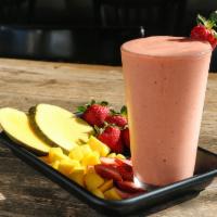 Strawberry Mango Smoothie · Strawberries, mango slices, frozen yogurt and apple juice.