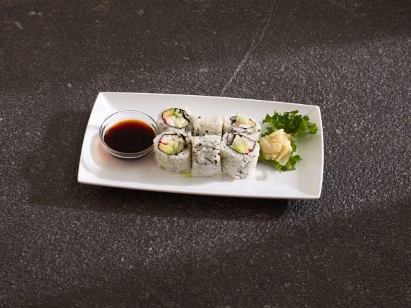 California Roll · Crab stick, avocado, cucumber and rice on outside.