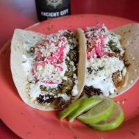 Chimichurri Pork Tacos · Our pork slow roasted and cooked in house, shredded cheddar Jack cheese, fresh chimichurri s...