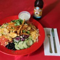 Sante Fe Chicken Salad · Cajun grilled chicken over chopped romaine, shredded red cabbage and carrots, diced tomatoes...