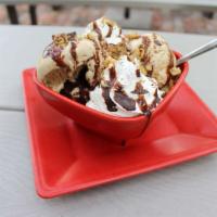 Mud Pie · Warm chocolate chip brownie with a choice of vanilla or coffee ice cream, whipped cream and ...