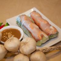 A2. Salad Roll · 2 rolls. Rice paper rolls served with vermicelli noodles, bean sprouts, lettuce, and a side ...