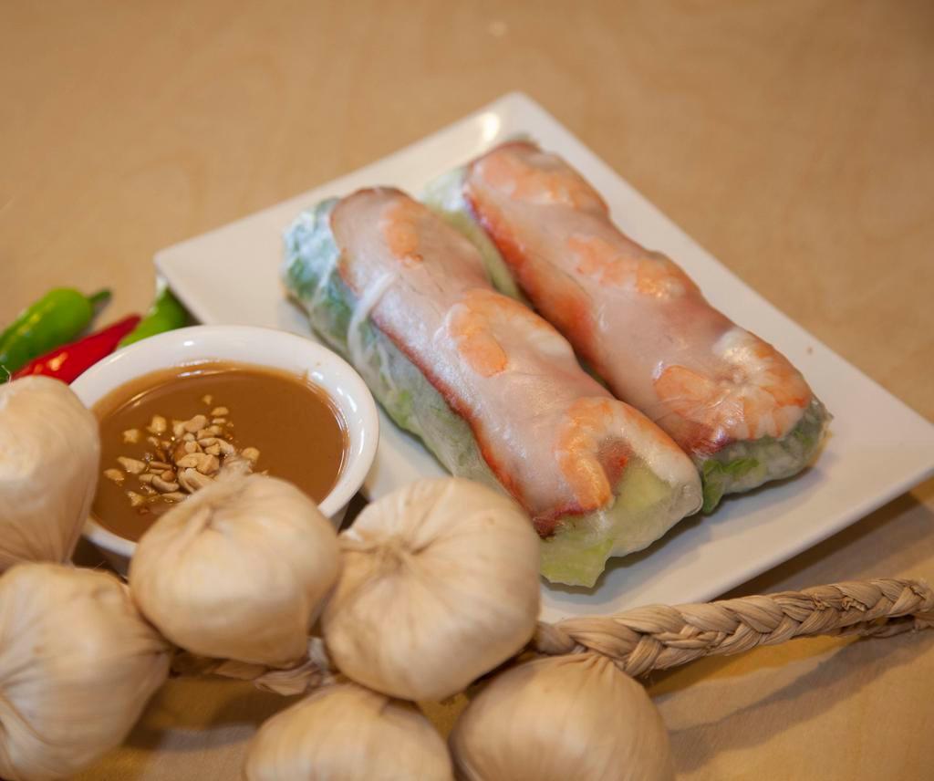 A2. Salad Roll · 2 rolls. Rice paper rolls served with vermicelli noodles, bean sprouts, lettuce, and a side of peanut sauce. Come with a choice of protein.