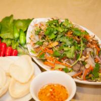 A5. Beef Salad · Mixing of beef, carrots, Chinese celery, daikon, onion, crushed roasted peanuts, fried shall...