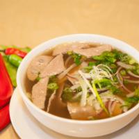 P1. Pho Sen Special Beef Soup · Eye round steak, well-done brisket, flank, tripe, soft tendon, and beef meatball with noodle...