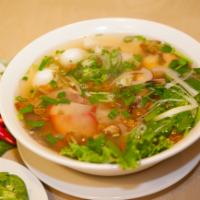 H1. Hu Tieu Dac Biet · BBQ pork, shrimp, squid and quail egg with rice noodle and chicken pork soup.