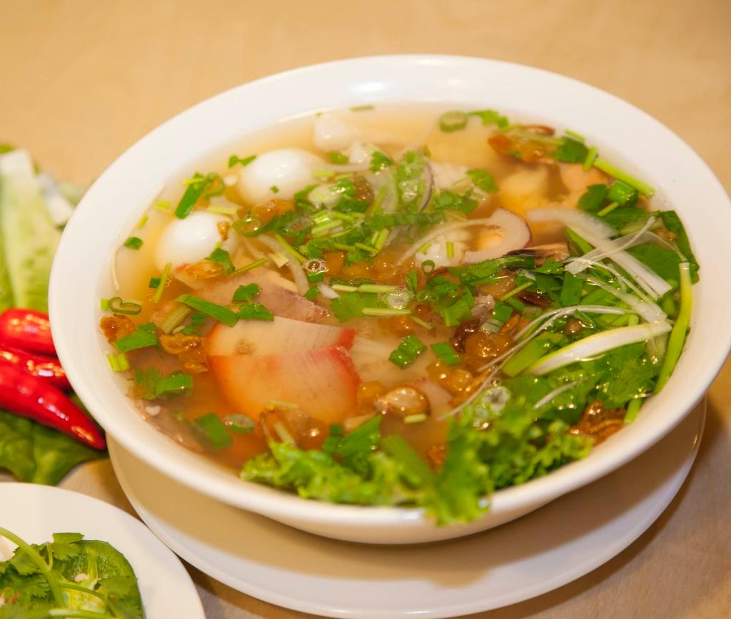 H1. Hu Tieu Dac Biet · BBQ pork, shrimp, squid and quail egg with rice noodle and chicken pork soup.