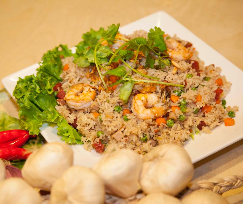 R7. Combination Fried Rice · Fried rice with BBQ pork, shrimp, Vietnamese sausage, egg, pea and carrot.