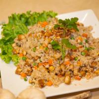 R9. Veggies Fried Rice · Fried rice with tofu, green pea and carrot.