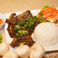R12. Korean Grilled Beef Short Ribs · Beef short ribs with steamed rice.