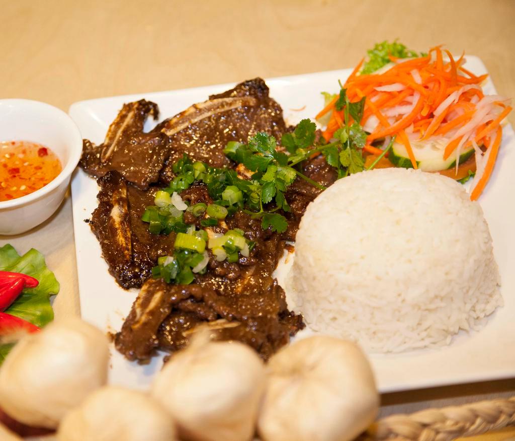 R12. Korean Grilled Beef Short Ribs · Beef short ribs with steamed rice.