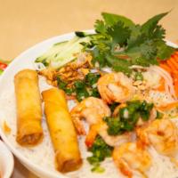 V3. Bun Tom Nuong Cha Gio · Grilled shrimp and egg rolls served with vermicelli dish.