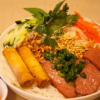 V4. Bun Nem Nuong Cha Gio · Vietnamese sausage patty and egg rolls served with vermicelli dish.