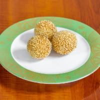 Sesame Ball · 3 pieces. Pastry made from rice flour and coated with sesame seeds.