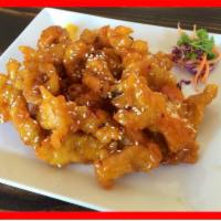 Orange Chicken  · Popcorn Chicken Breast tossed in House special Orange sauce topped with toasted sesame and s...