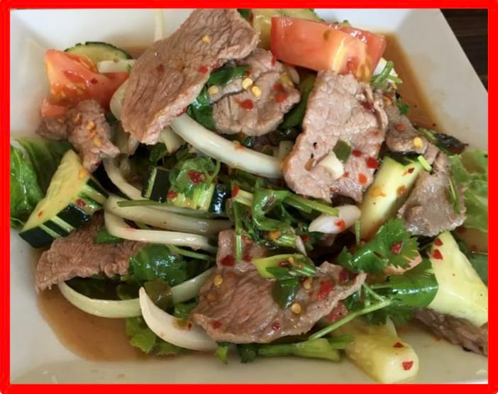 Beef Salad · Slices grilled steak, Tomato, Cucumber, Romaine lettuce, Onion, and Roasted rice powder bursting with fresh Lime chili dressing
