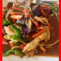 Spicy Eggplant Stir Fry · Chili garlic sauce with eggplant, onion, carrot, bell pepper and basil leaves.