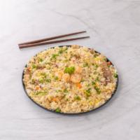 71. House Special Fried Rice · Beef, chicken, shrimp, peas, carrots and eggs stir fried rice.