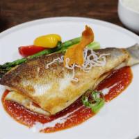 Thai-Spiced Sea Bass · Whole branzino sea bass seared with asparagus and home-made spicy sauce made with Thai chili...