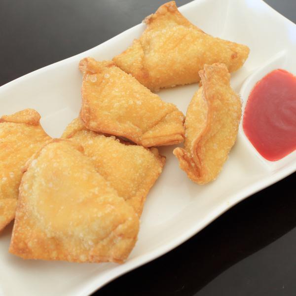 Fried Crab Cheese Puffs · Crispy wheat wrap stuffed with a tasty mixture of crab meat and cream cheese. 6 pieces.