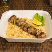 Chicken Kebobs · 1 skewer of marinated tender meat served with rice pilaf.