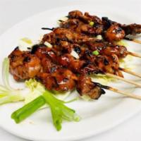 Pork BBQ · 6 pieces. Grilled pork barbecue skewers.