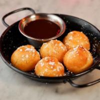 Belgium Puffs Hey · Cream-filled fried pastry balls, chocolate sauce.