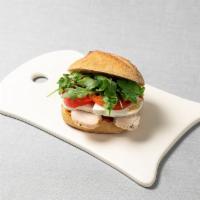 Chicken Fresh Mozzarella on a French Roll · with tomato-pepper jam on a French roll