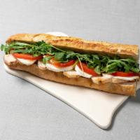 Chicken Mozzarella Baguette · With tomato-pepper jam on a baguette