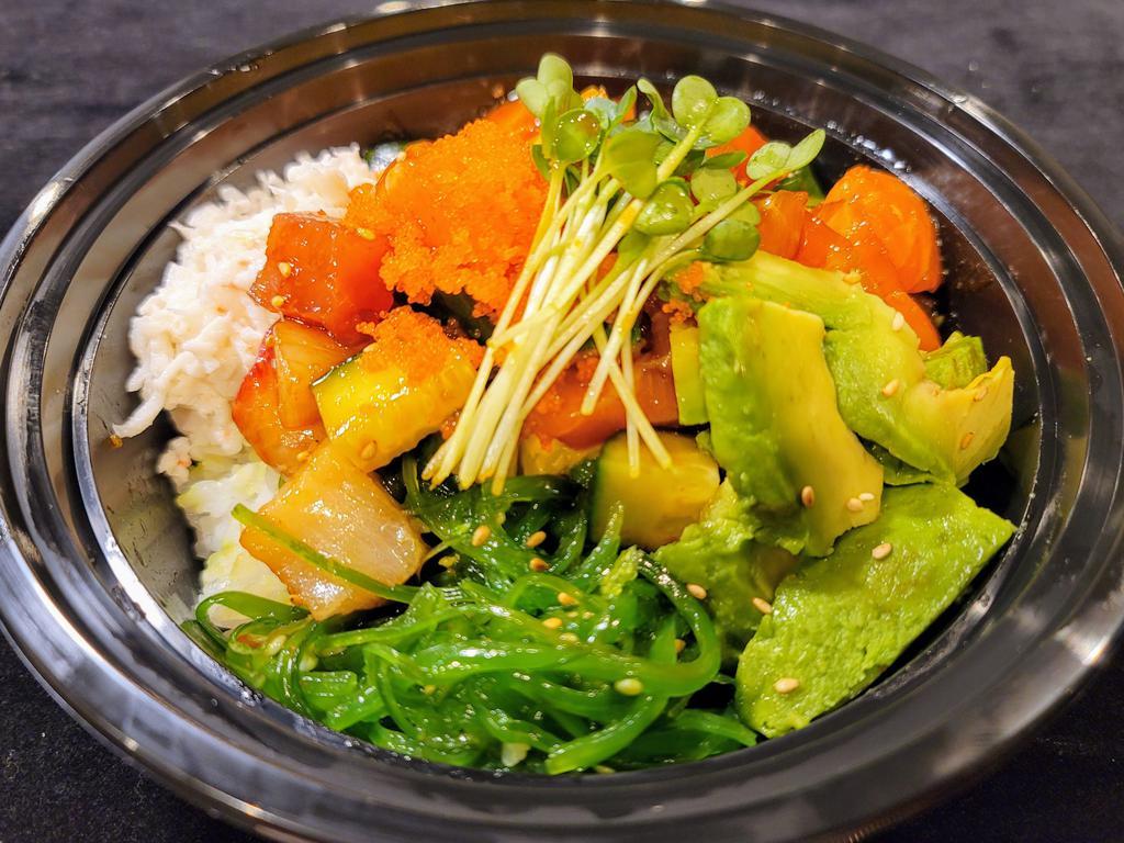 Poke Bowl with Rice · Mixed fish, cucumber tossed in house poke sauce and topped with seaweed salad , avocado, masago and kaiware over sushi rice.