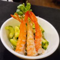 Ebi Sunomono Salad · Thin slices of cucumber in house vinaigrette dressing topped with 2 pieces boiled ebi.