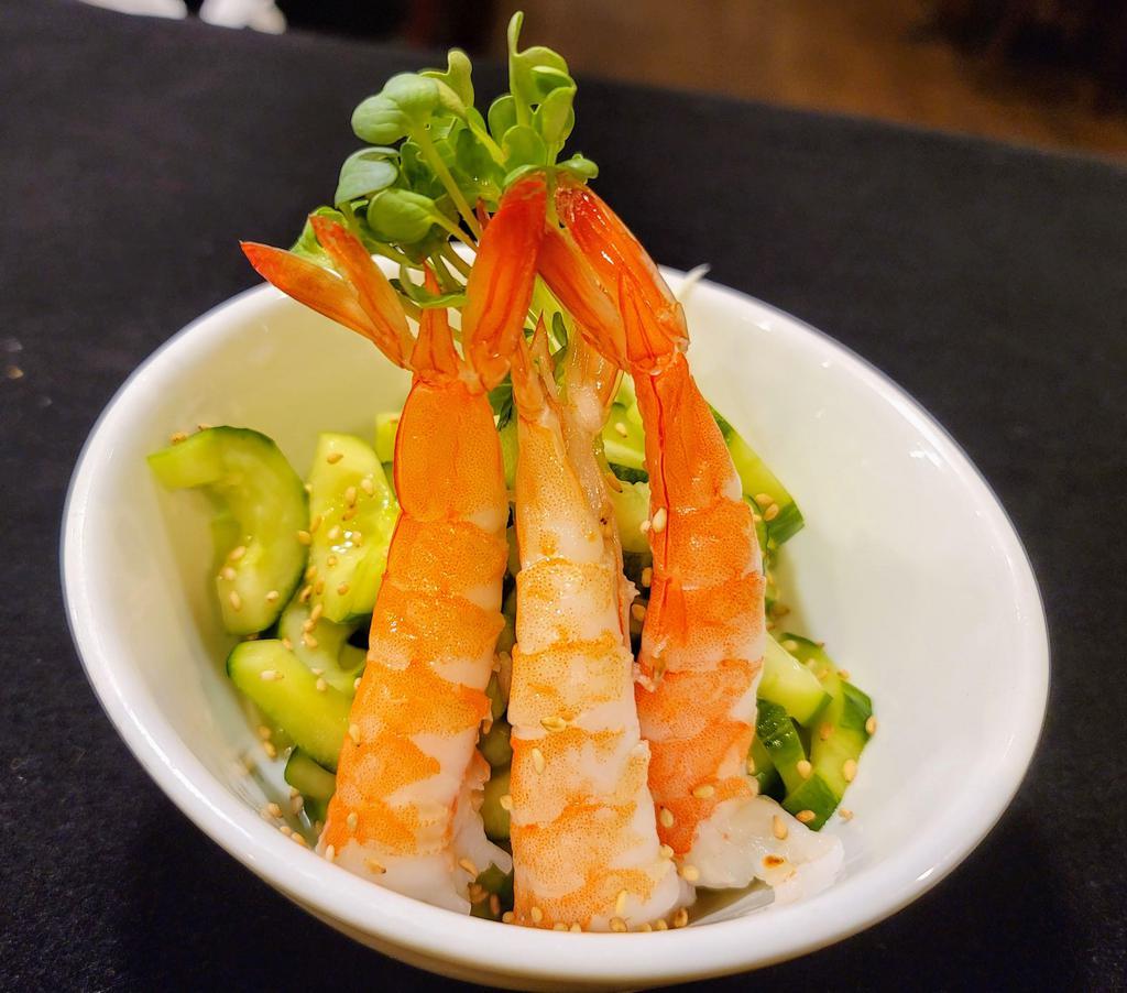 Ebi Sunomono Salad · Thin slices of cucumber in house vinaigrette dressing topped with 2 pieces boiled ebi.