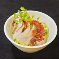 Tako Sunomono Salad · Thin slices of cucumber in a house vinaigrette dressing topped with 2-3 pieces cooked tako.