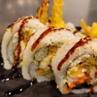 Spider Roll · Deep fried soft shell crab, imitation crab, cucumber, masago, and sweet sauce.