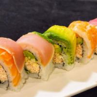 Rainbow Roll · Imitation crab mix, avocado, and cucumber. Topped with tuna, salmon, albacore, hamachi, shri...
