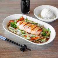 Grilled Salmon Rice Bowl · Grilled salmon served over sauteed vegetable in house sauce and rice.
