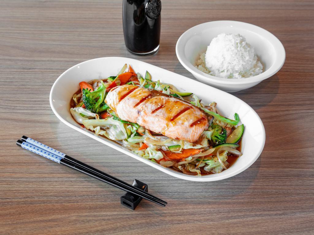 Grilled Salmon Rice Bowl · Grilled salmon served over sauteed vegetable in house sauce and rice.