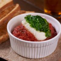 A Couple a Meatballs · 2 home-made meatballs in our house marinara, served with garlic toast.